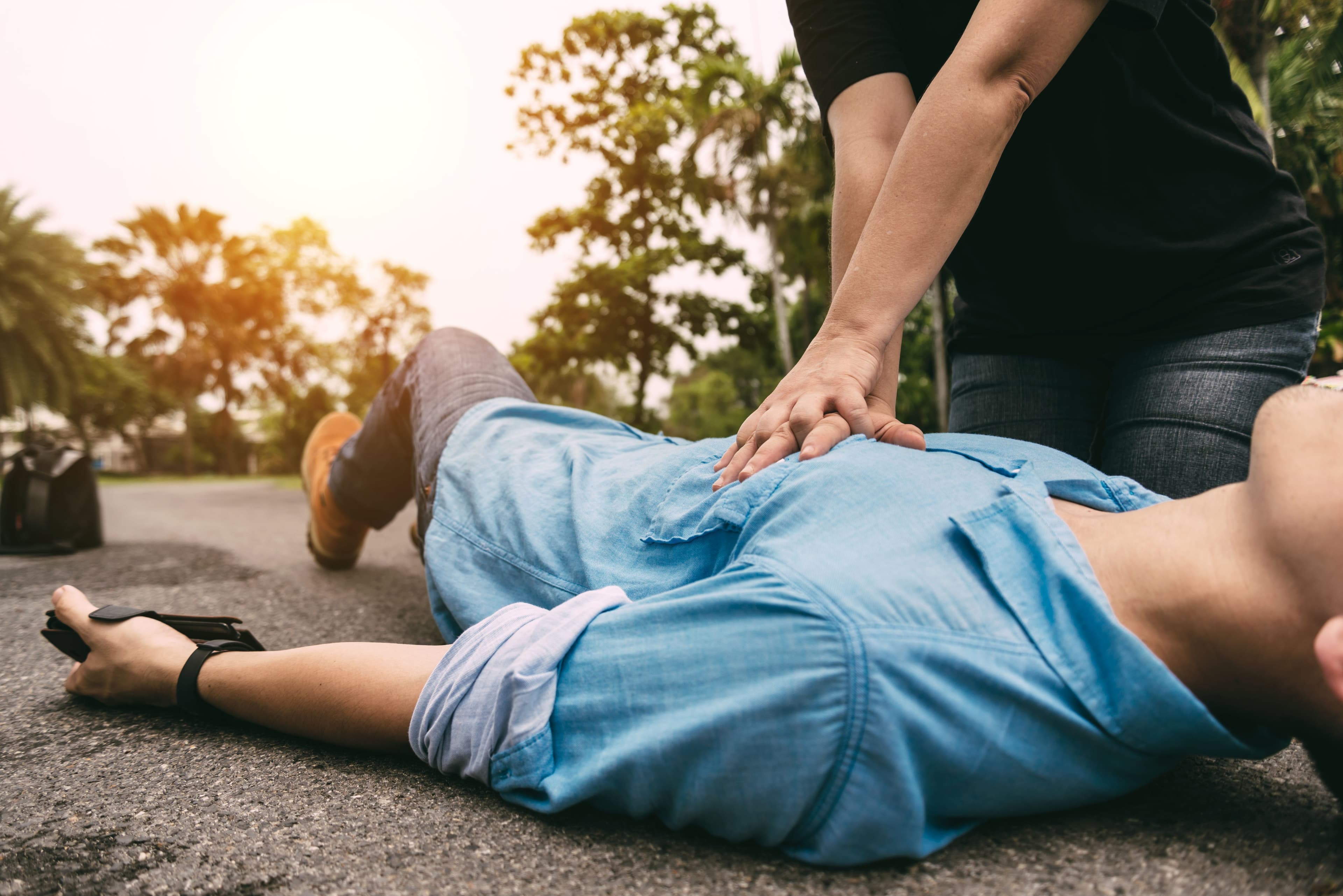 Participant practicing CPR during first aid training