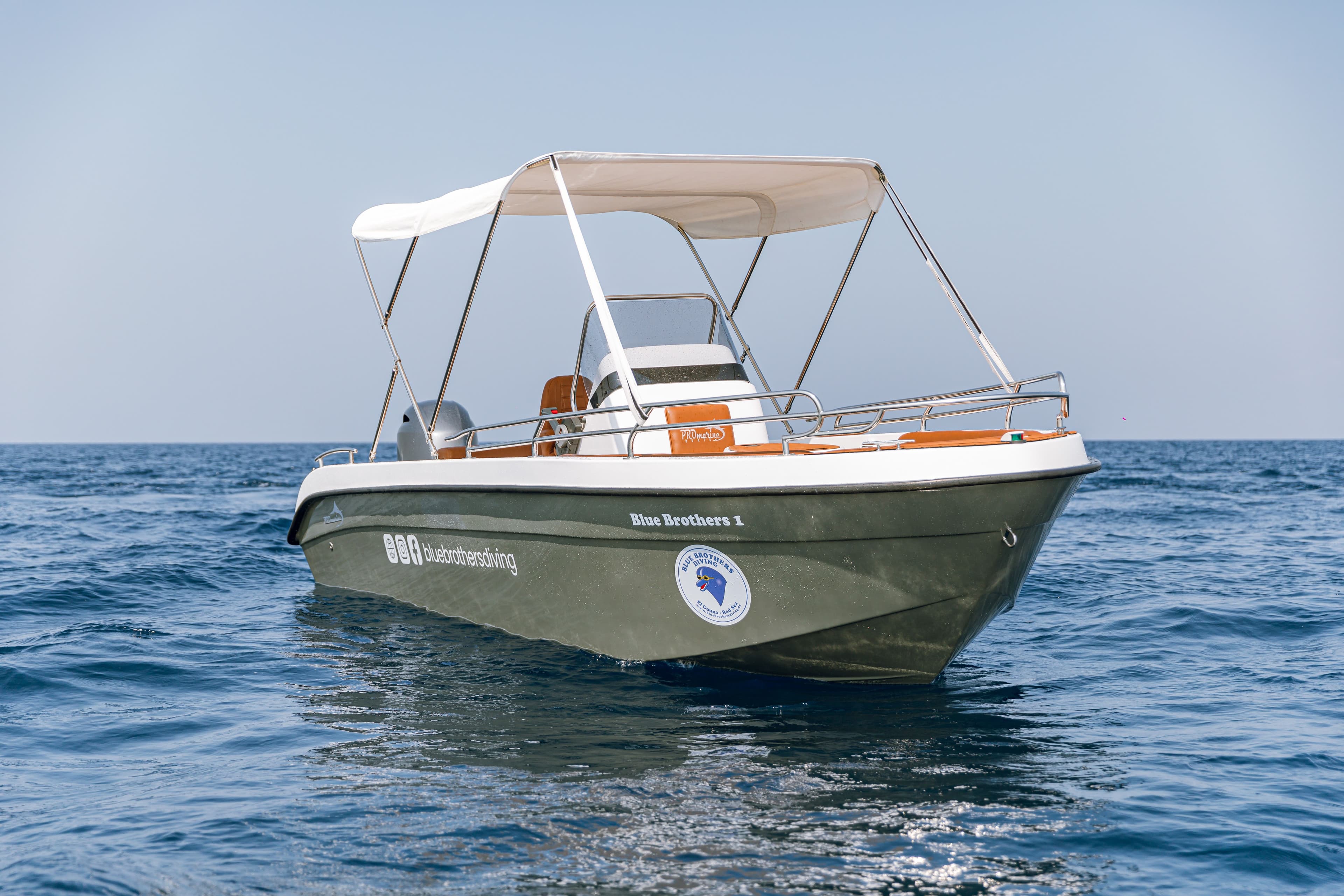 Blue Brothers 1 speedboat anchored in clear Red Sea water