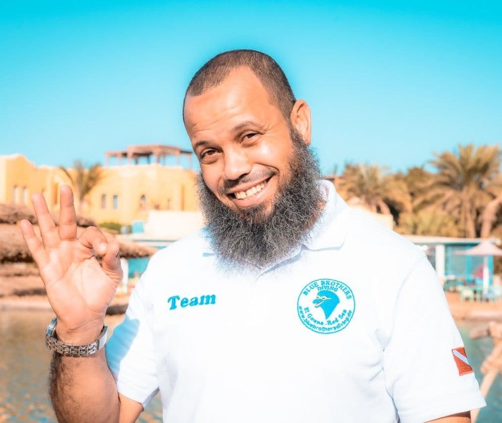 Hesham from the Blue Brothers Diving team making an OK sign
