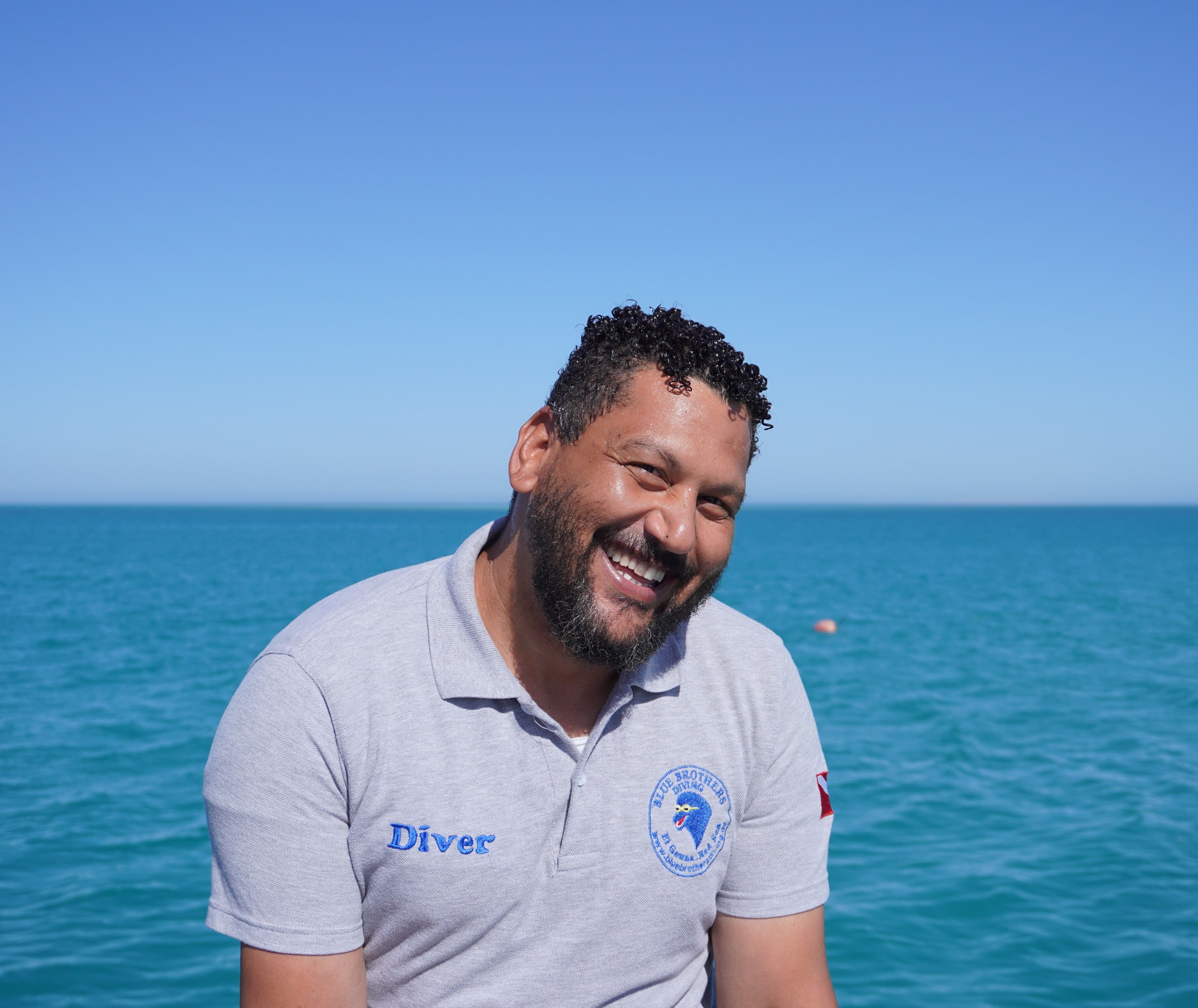 Mansour from the Blue Brothers Diving team in front of the Red Sea