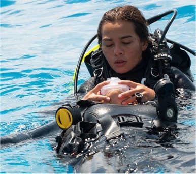 Rescue Diver student practicing rescue skills in the pool
