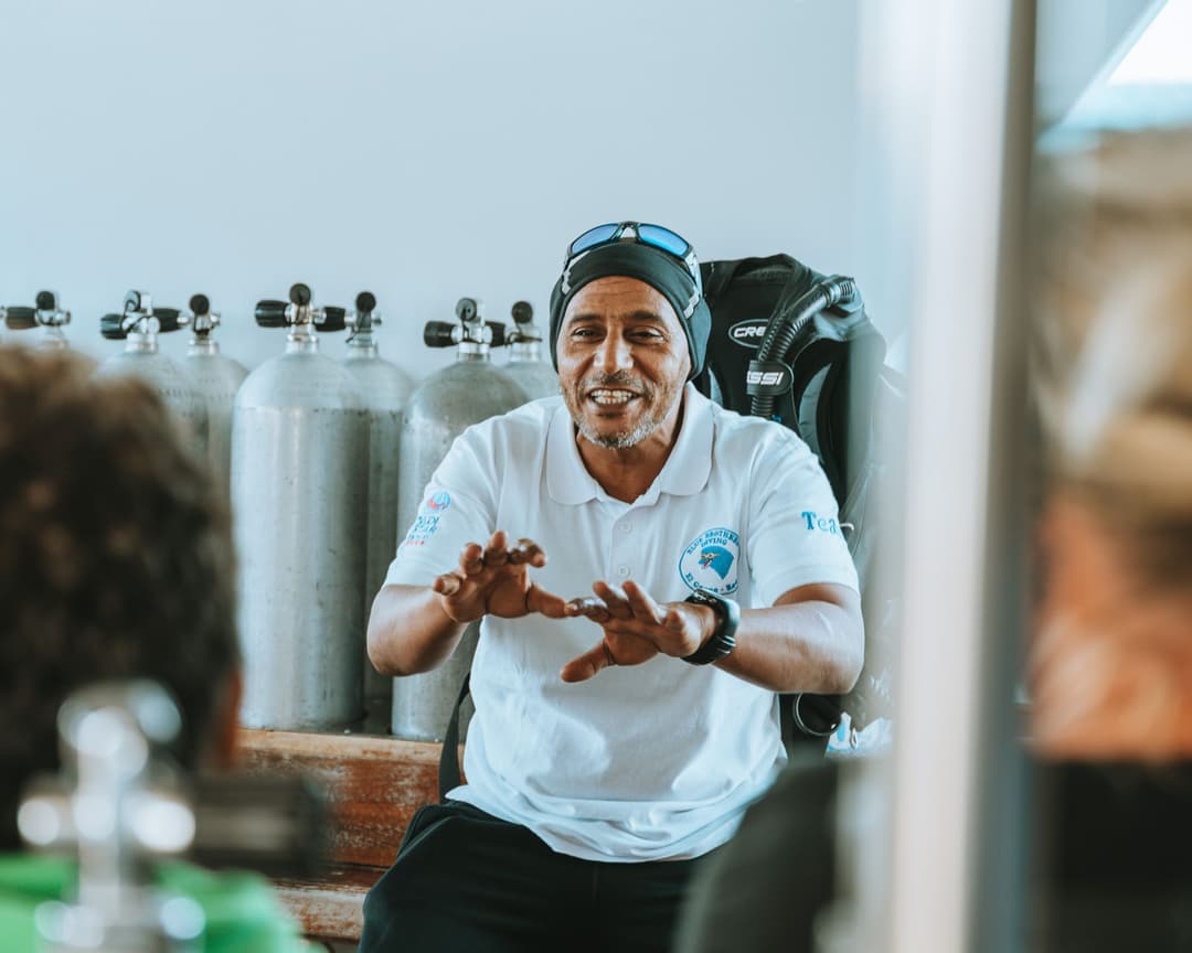 Dive instructor teaching a Divemaster classroom session